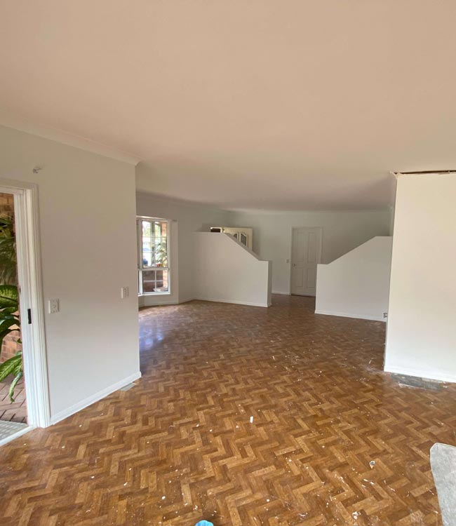 Brisbane home renovation in progress with walls stripped back to the frame