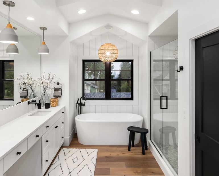 Finished bathroom renovation with freestanding bath