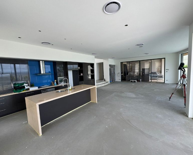 Freshly painted open-plan kitchen and living area